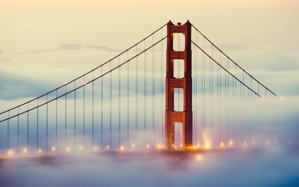 Stunning Golden Gate Bridge Wallpaper: Foggy Sunrise Serenity