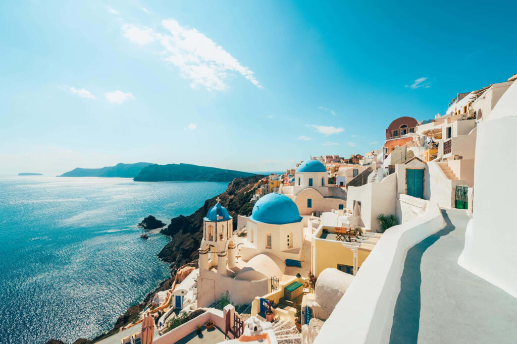Breathtaking Santorini Wallpaper: Whitewashed Buildings & Aegean Sea
