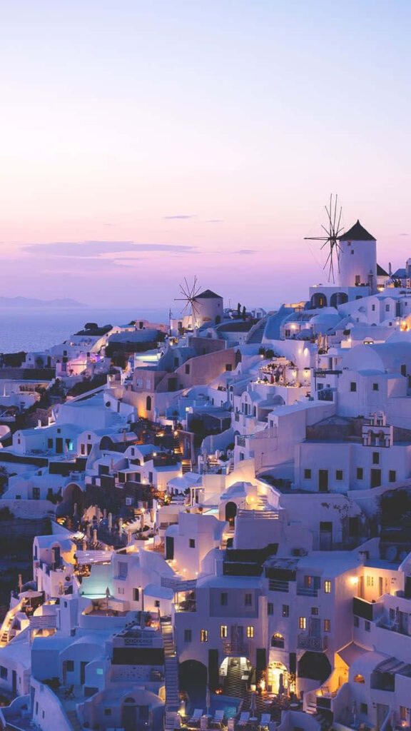 Breathtaking Santorini Sunset Wallpaper: Whitewashed Buildings & Blue Domes