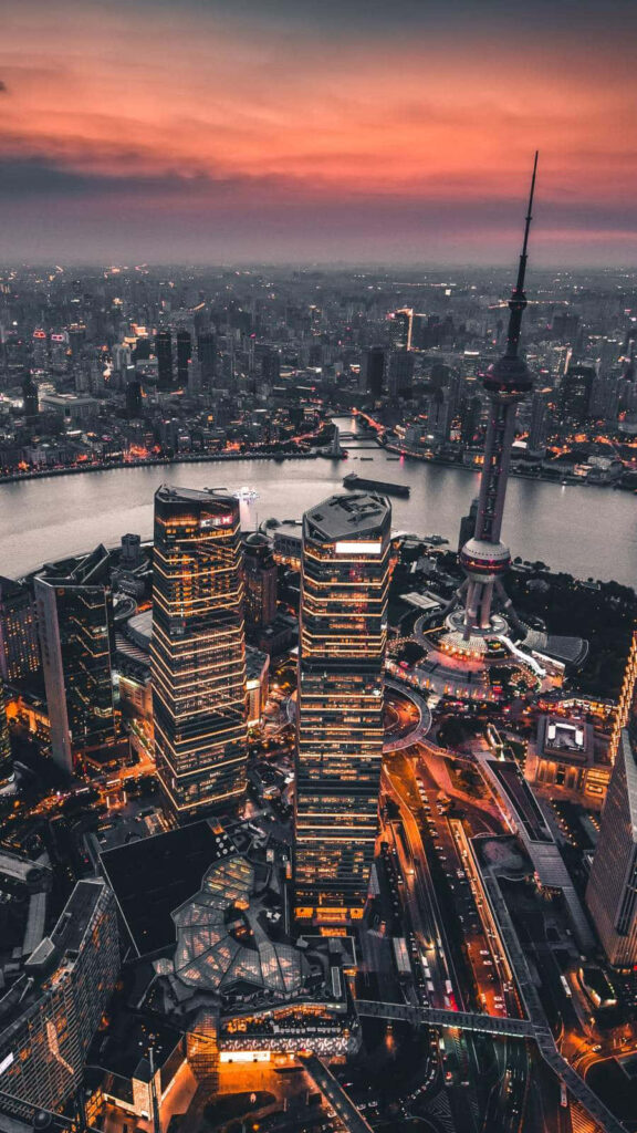 Breathtaking Shanghai Sunset Skyline Wallpaper for iPhone Background