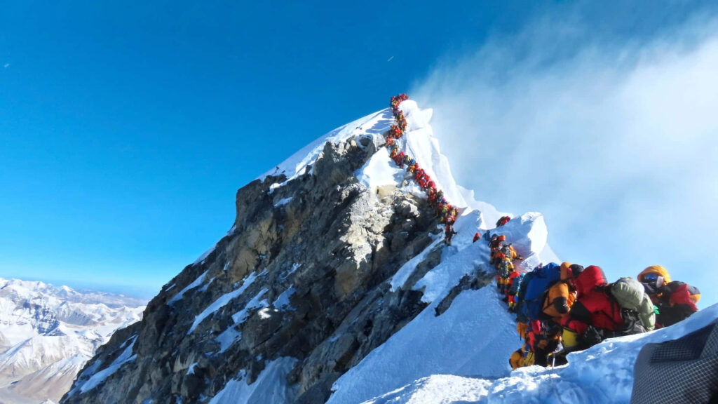 Stunning Mountain Climbers Adventure Wallpaper - Clear Blue Sky