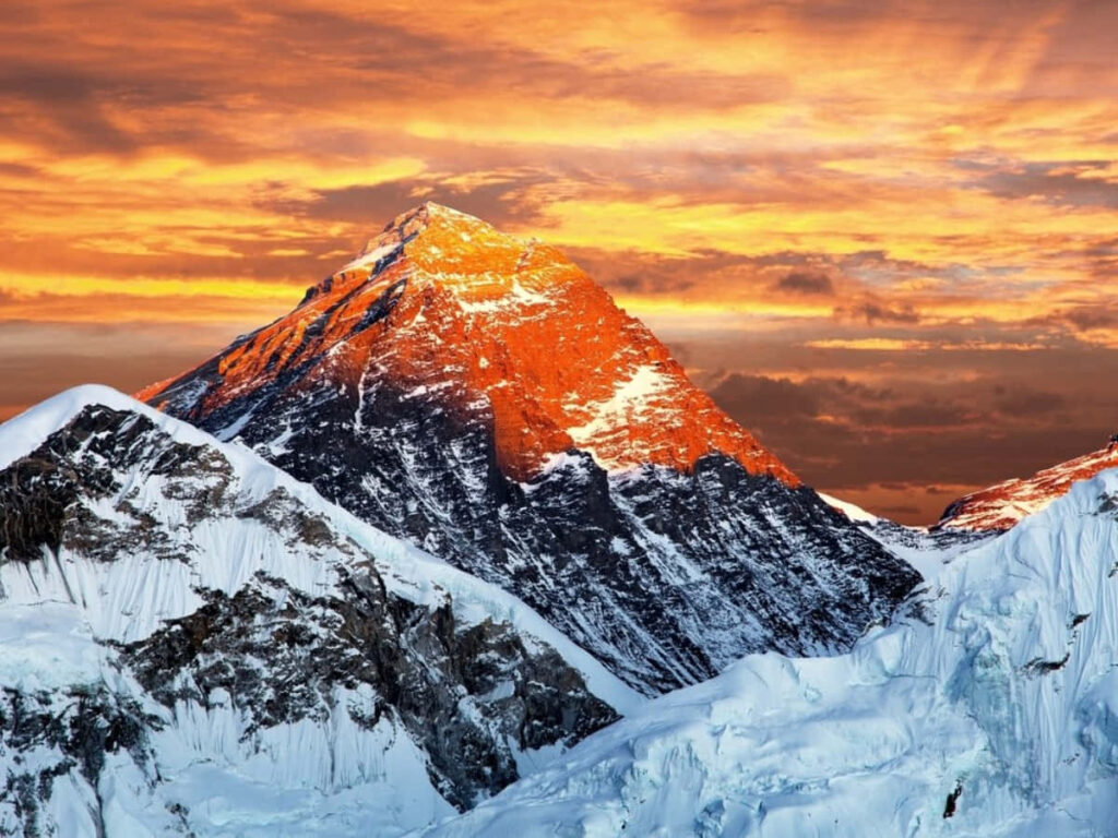 Snowy Mountain Range at Sunset - Stunning Wallpaper Background