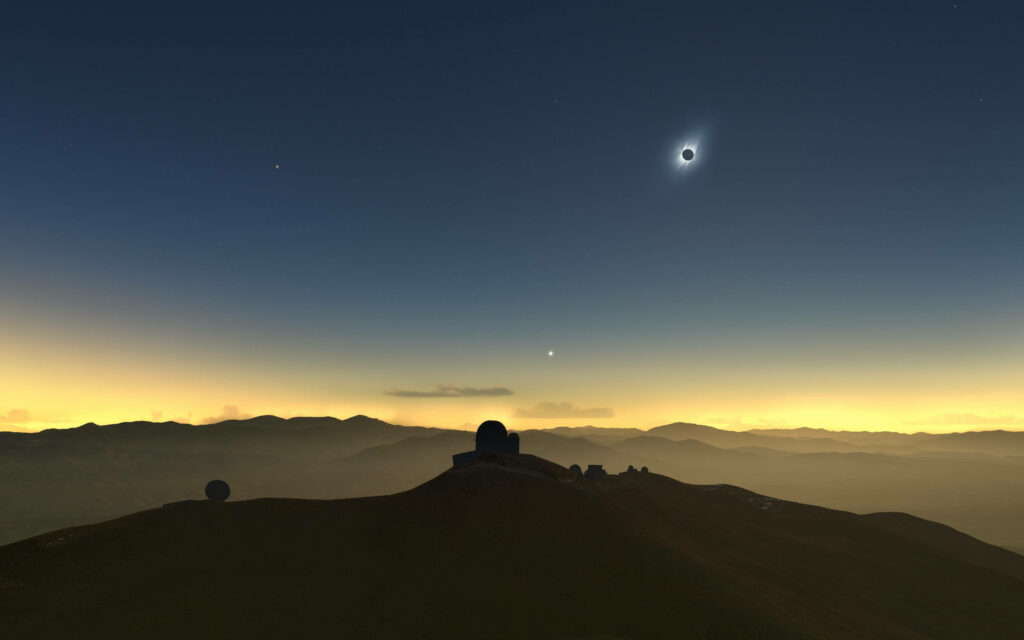 Breathtaking Solar Eclipse Wallpaper Over Desert Landscape