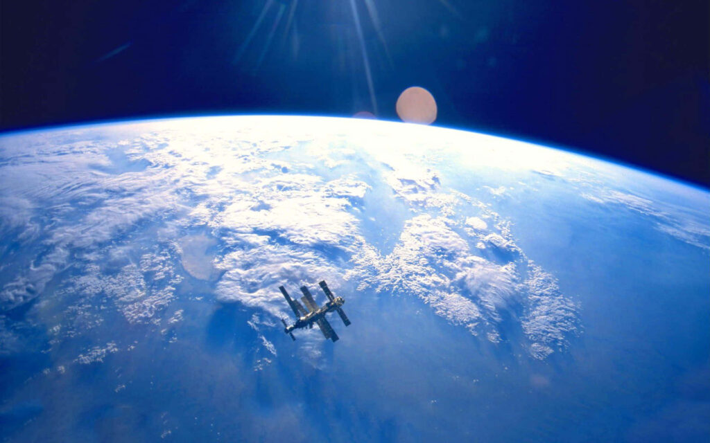 Stunning Space Station Wallpaper: Earth’s Curved Horizon in Vibrant Hues