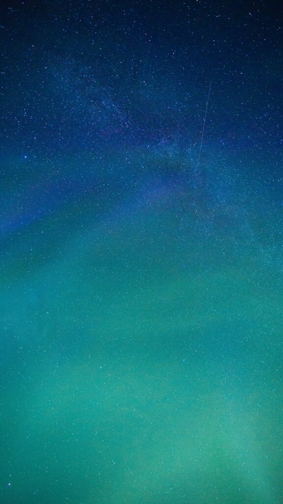 Stunning Starry Sky Wallpaper: Deep Blue to Green Gradient Background