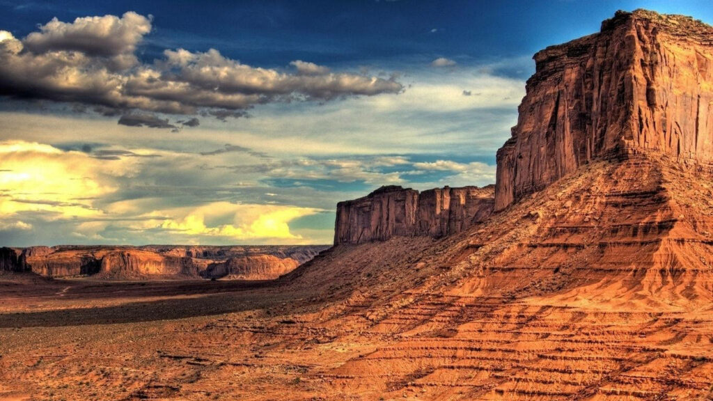 Breathtaking Sunset Wallpaper Over Desert Mountains & Sandstone Cliffs