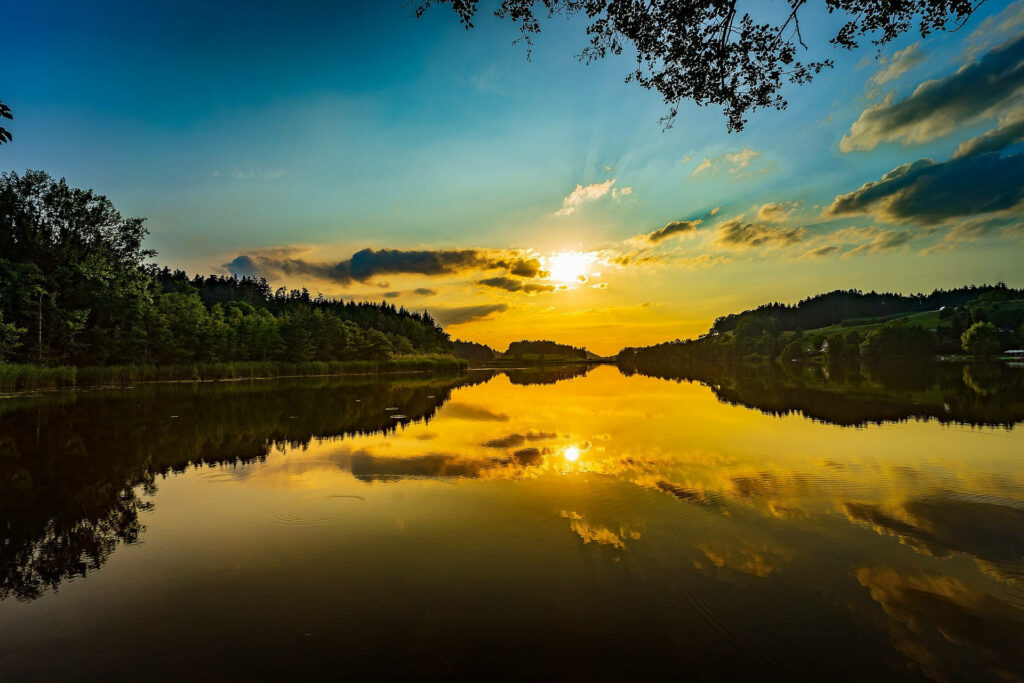 Peaceful Sunset Lake Wallpaper: Tranquil Nature Background