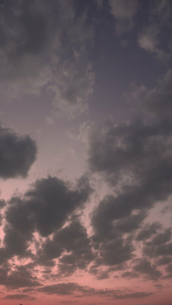 Stunning HD Sunset Sky Wallpaper with Dramatic Grey Clouds