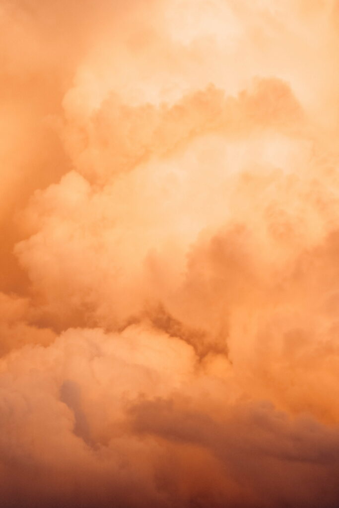 Breathtaking Sunset Sky HD Phone Wallpaper with Fluffy Clouds