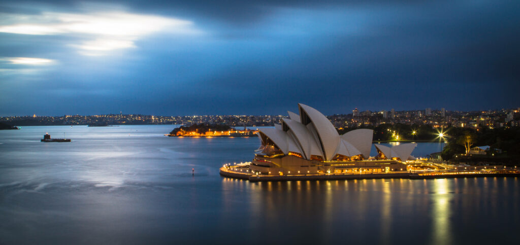 Breathtaking Sydney Aerial View: Opera House & Harbor Dawn Wallpaper