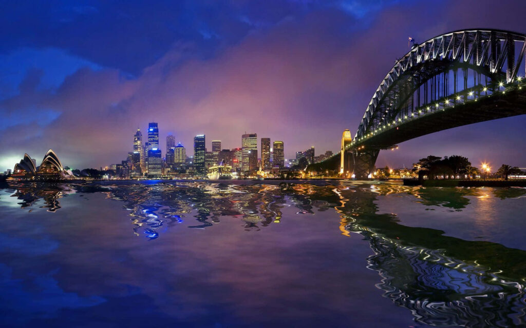 Stunning Sydney Nighttime Wallpaper: Harbour Bridge & Opera House Glow