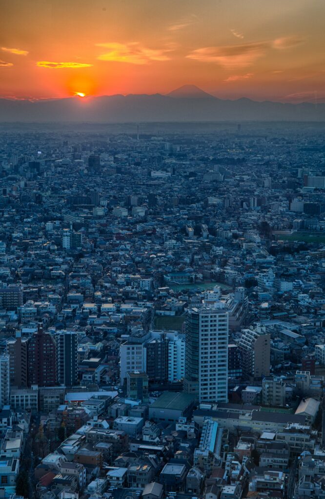 Stunning Tokyo Cityscape Wallpaper at Sunset with Mount Fuji