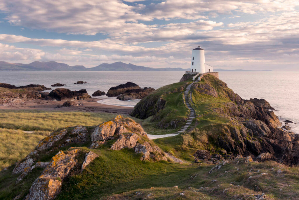 Breathtaking Twr Mawr Lighthouse: Scenic UK Wallpaper Background