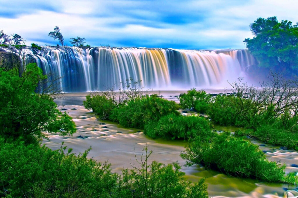 Vibrant Waterfall Wallpaper: Serene Nature Background with Greenery