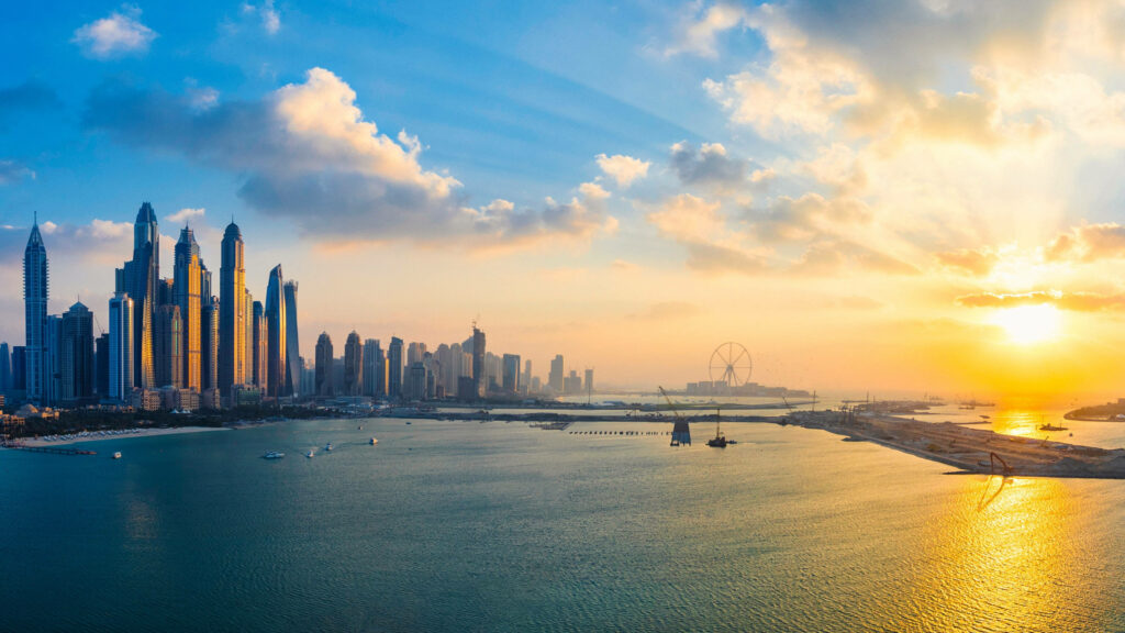 Stunning Waterfront Sunset over High-Rise Cityscape Wallpaper in 4K