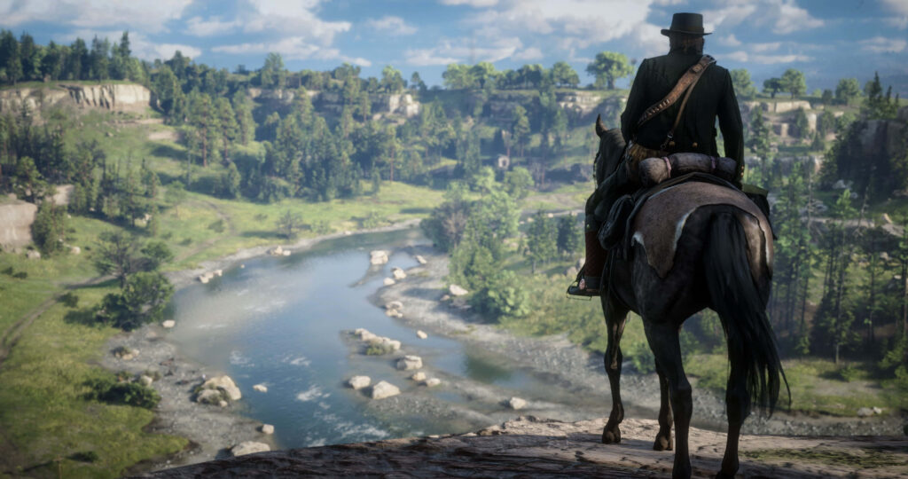 Breathtaking Wild West Wallpaper: Lone Rider & Serene River Valley