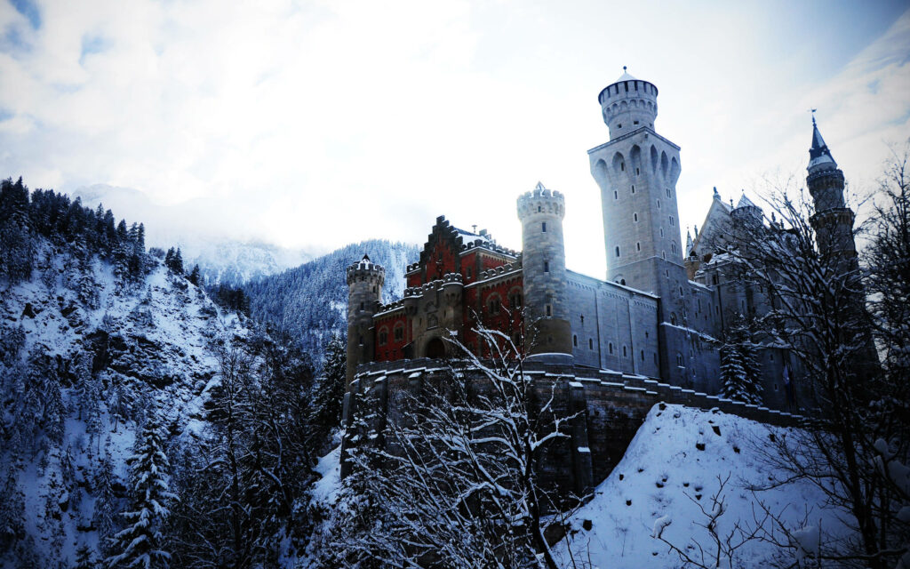 Neuschwanstein Castle Winter Wallpaper: Snowy Fairy-Tale Landscape