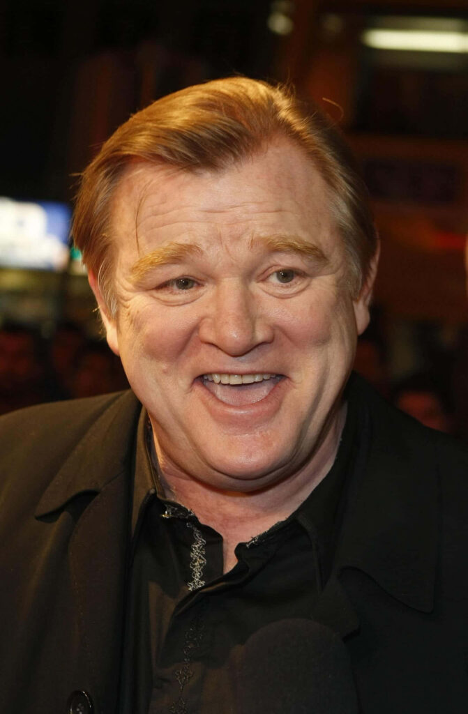 Brendan Gleeson close-up smiling candid at public event vibrant lighting high-resolution wallpaper