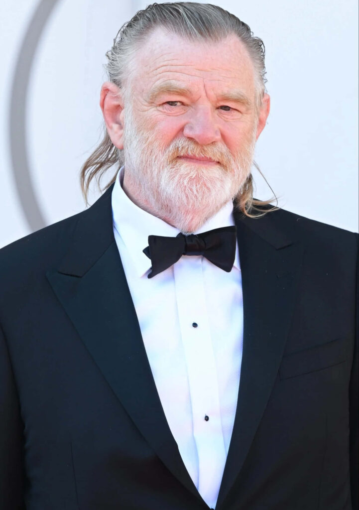 Brendan Gleeson in black tuxedo with white shirt and bow tie elegant celebrity wallpaper background