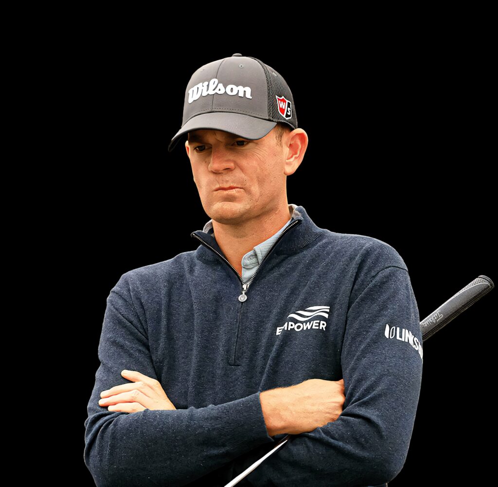 Brendan Steele confident pose golf wallpaper dark navy jacket Wilson cap sports background