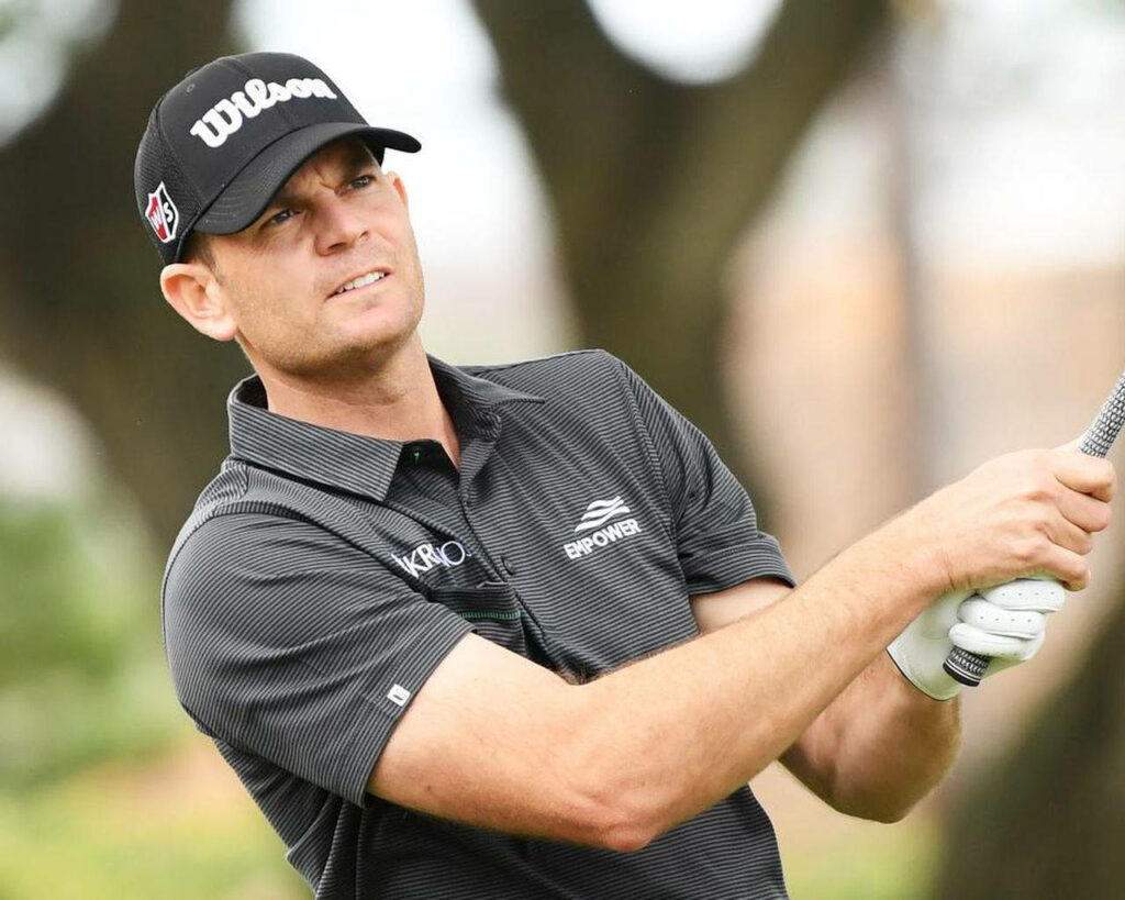 Brendan Steele professional golfer focused golf swing sunny day Wilson cap athletic sports wallpaper