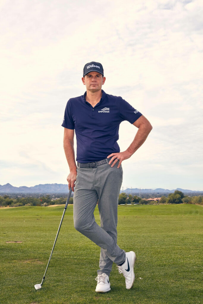 Brendan Steele golfer leaning on club scenic golf course mountains cloudy sky high res wallpaper