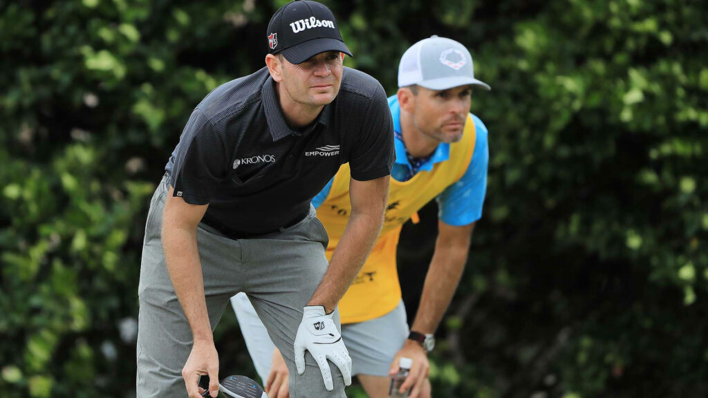 Brendan Steele and caddy on lush golf course teamwork sports wallpaper with detailed attire