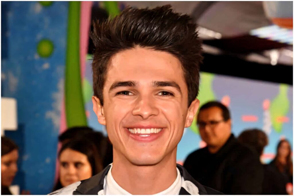 Brent Rivera vibrant close-up portrait smiling at event with colorful decor modern celebrity wallpaper