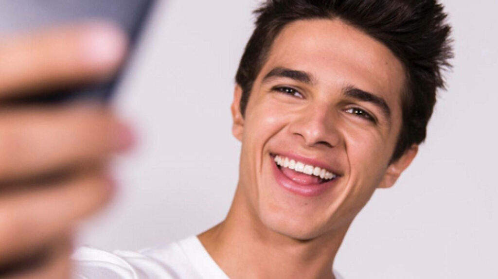 Brent Rivera smiling selfie wallpaper with soft background cheerful casual style vibrant energy