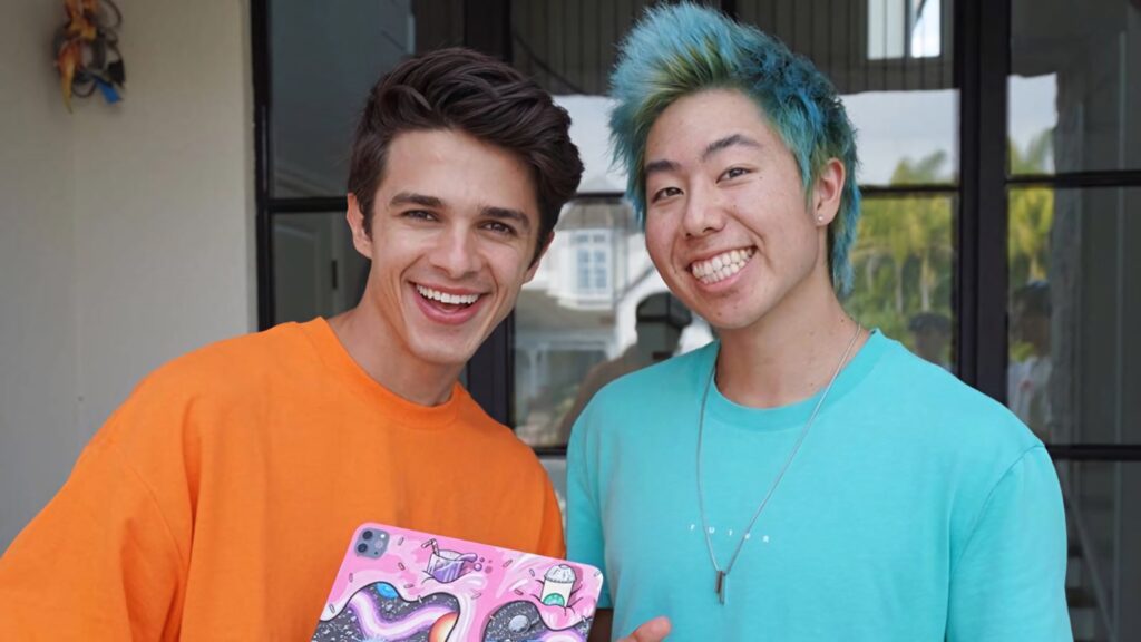 Brent Rivera and Zach Hsieh smiling with colorful tablet artwork vibrant friendship wallpaper background