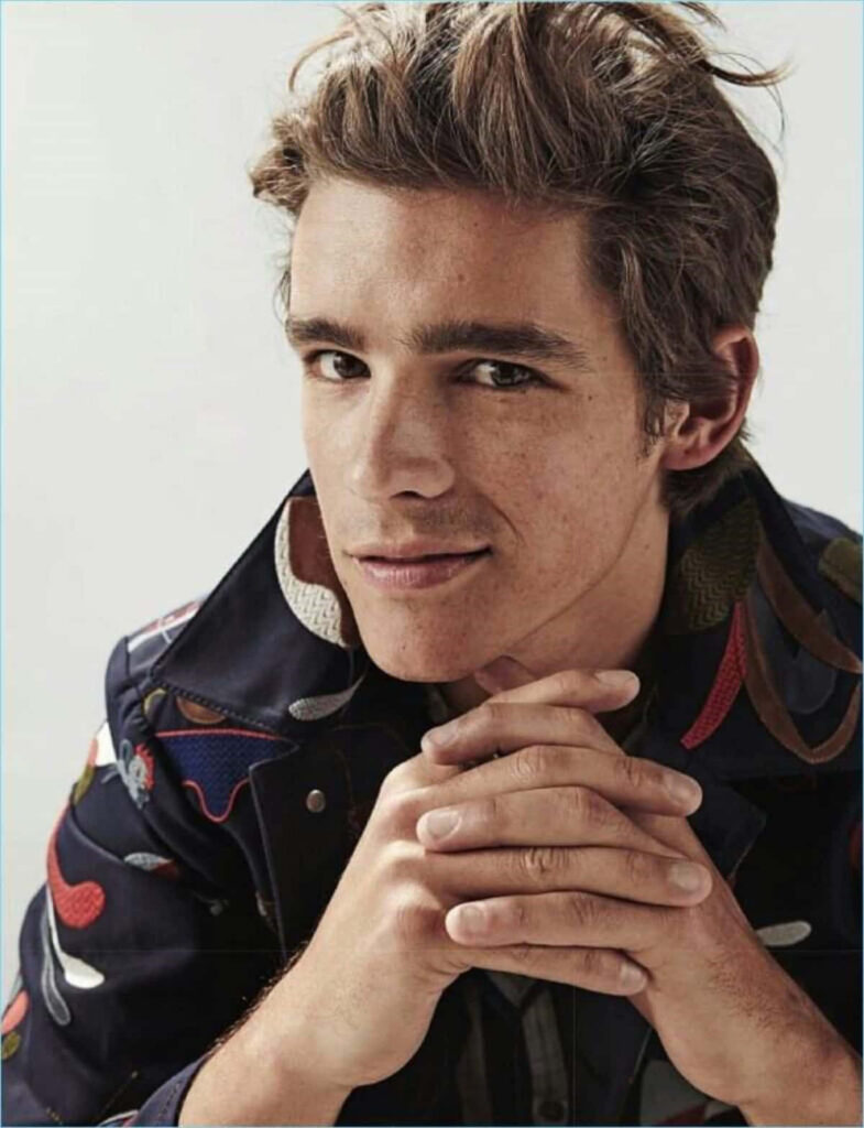 Brenton Thwaites portrait in colorful fashion jacket high resolution stylish charismatic expression Wallpaper