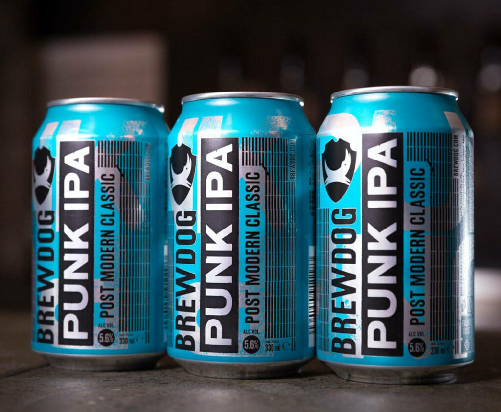 Three BrewDog Punk IPA cans with turquoise black branding on dark modern craft beer background Wallpaper