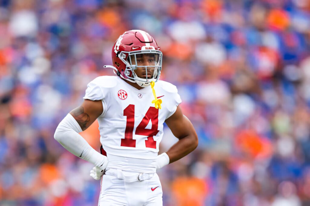Brian Branch Alabama Crimson Tide football star number 14 action vibrant stadium wallpaper