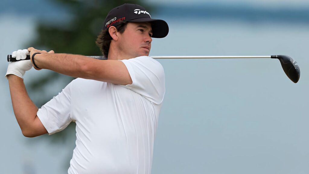 Brian Harman finishing golf swing crisp details white attire black cap high-resolution wallpaper