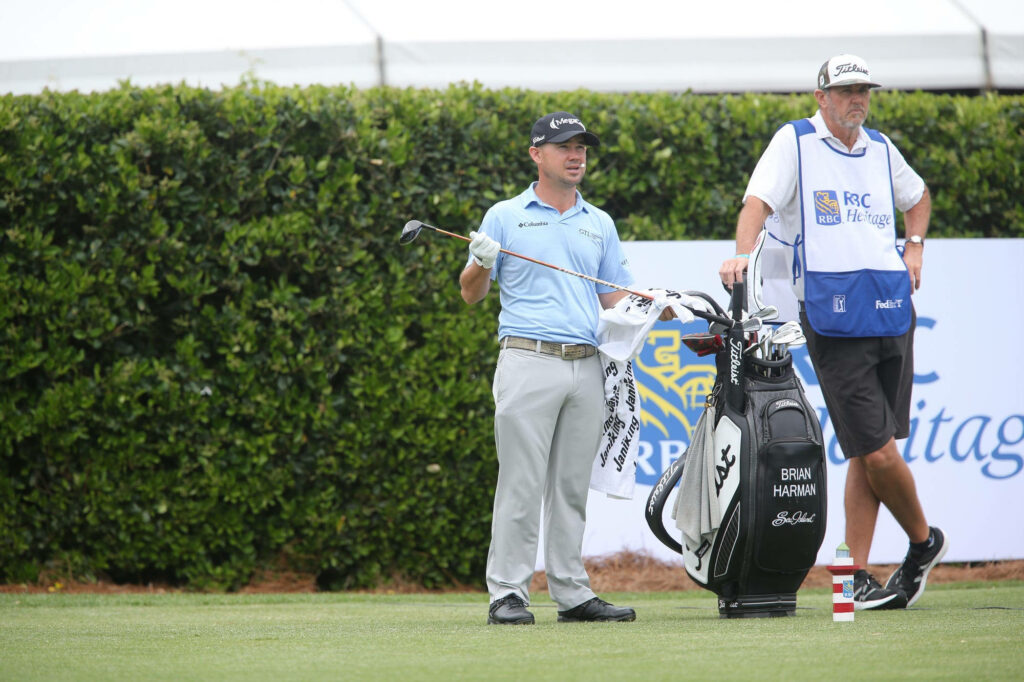Brian Harman with caddy on green golf course teamwork sportsmanship tournament high definition Wallpaper