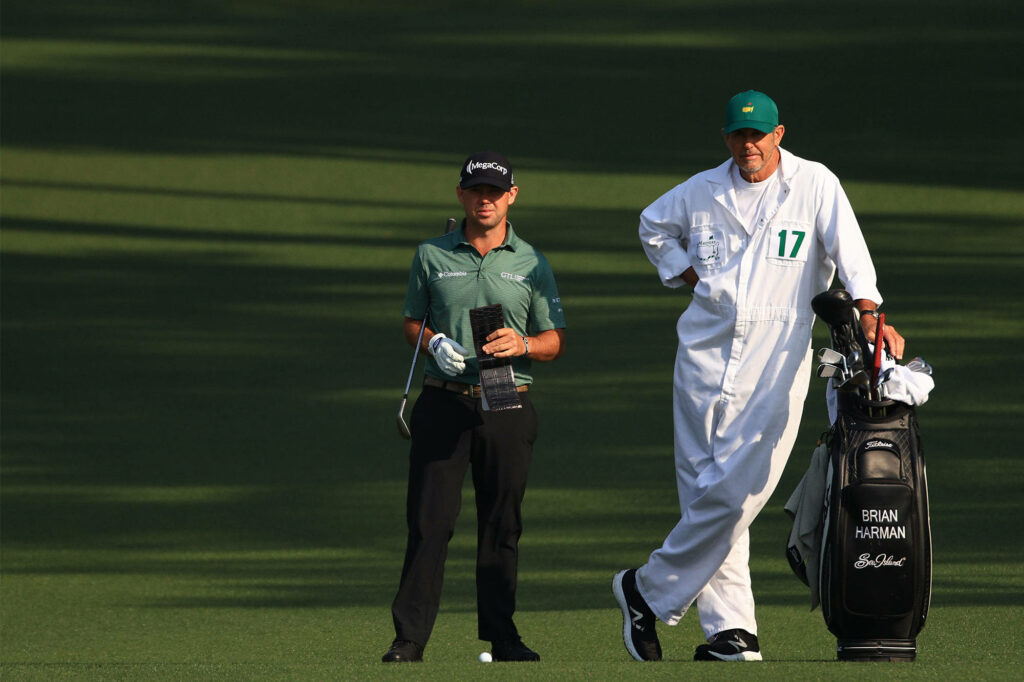 Brian Harman and caddie Scott Tway on lush golf course teamwork sportsmanship tournament attire Wallpaper