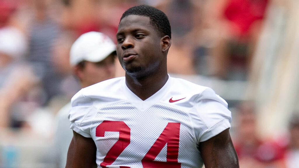 Brian Robinson Jr Alabama football jersey number 24 action pose stadium background wallpaper