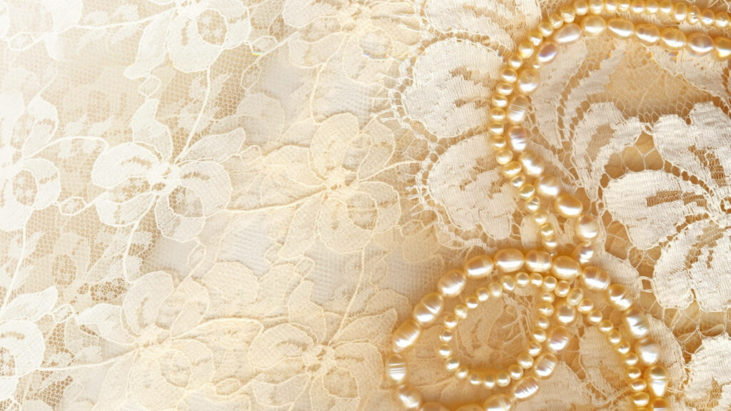 Pearl-studded Elegance: Captivating Necklace in Floral Lace – A Stylized Wedding Shoot Wallpaper