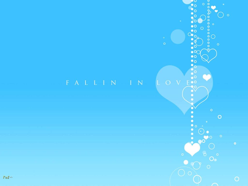 Blue gradient wallpaper with white hearts and bubbles and Fallin In Love romantic text design