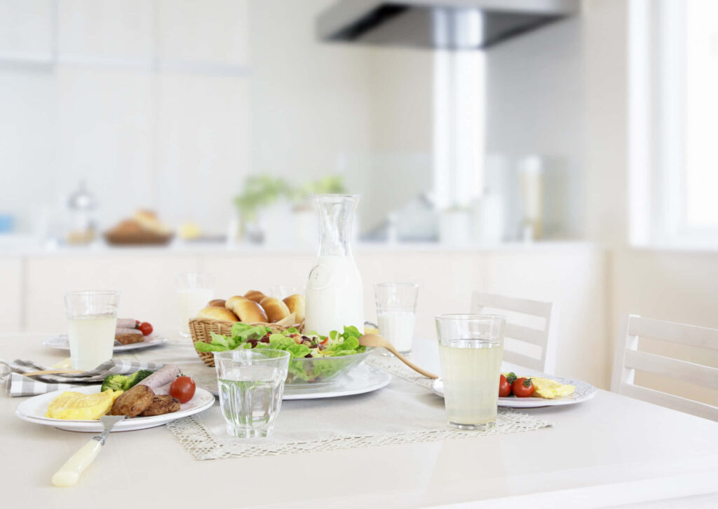 Bright Breakfast Table Wallpaper: Modern Kitchen Food Setup