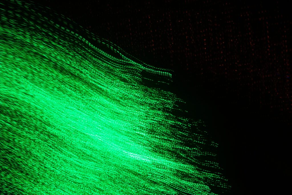 Captivating Green Light Trails Wallpaper - Ethereal Movement Background
