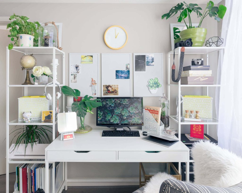 Bright modern virtual office background with white desk greenery and cameras for Zoom calls Wallpaper