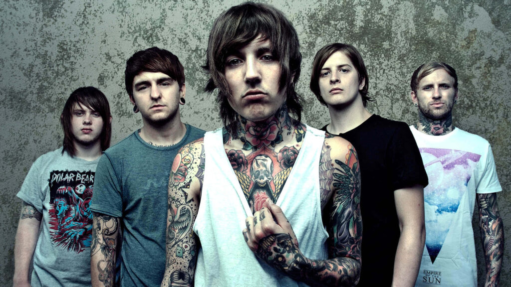 Portrait wallpaper of Bring Me The Horizon band members with intense expressions and tattoos