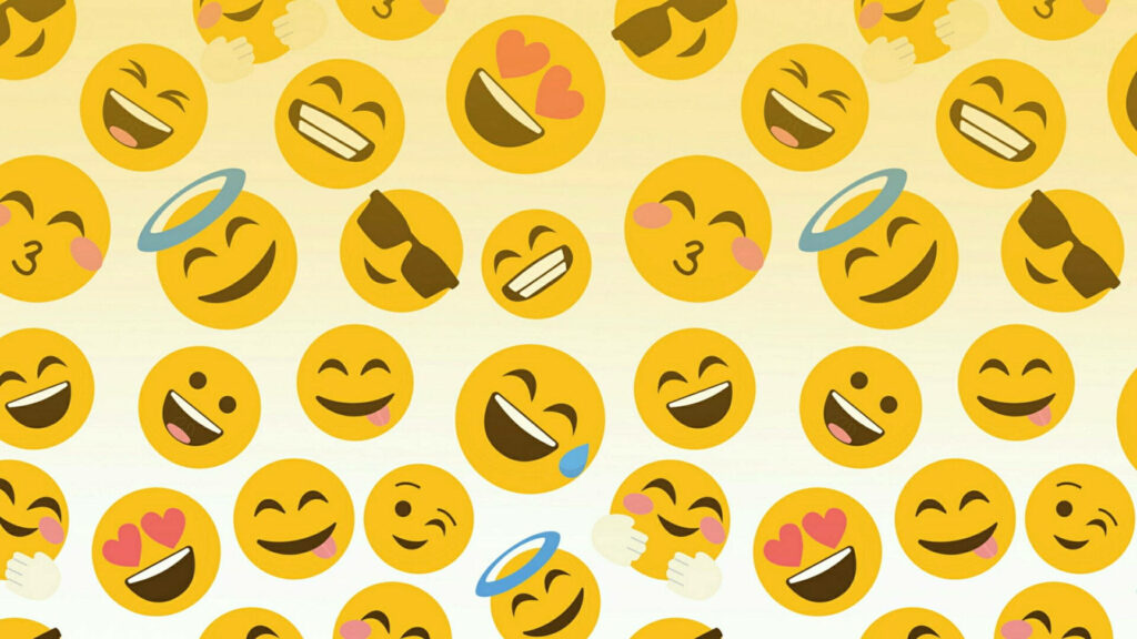 Overflowing Happiness: A Vibrant Emoji Wallpaper
