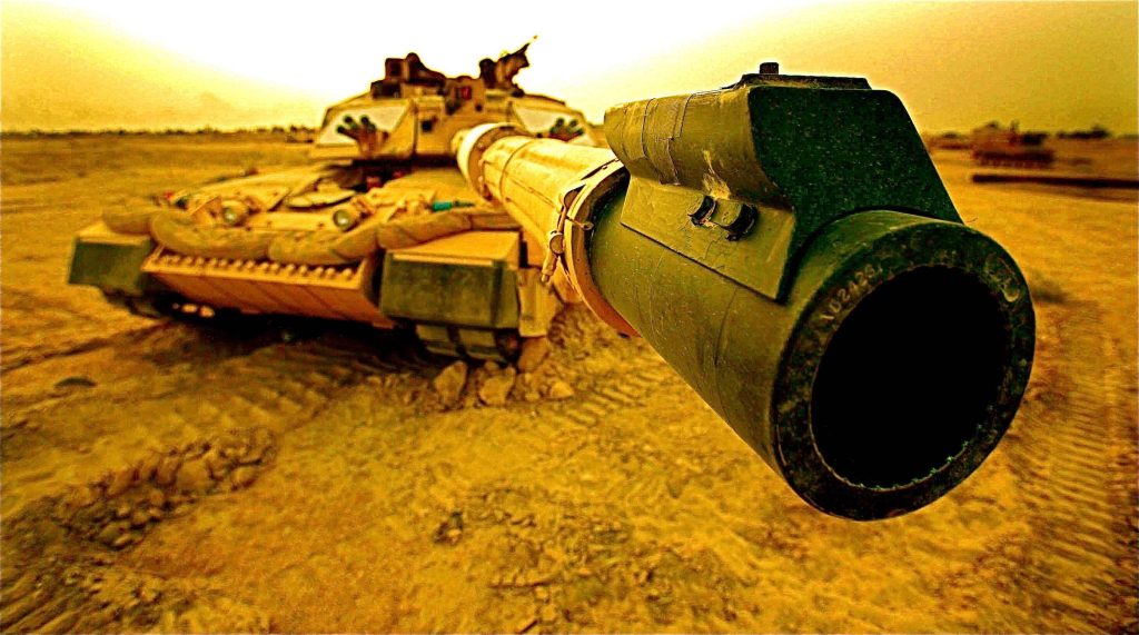 Close-up of British Challenger 2 tank main gun in golden desert background tank wallpaper