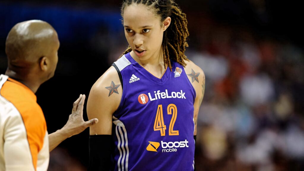 Brittney Griner in Phoenix Mercury jersey 42 talking to referee intense WNBA game wallpaper