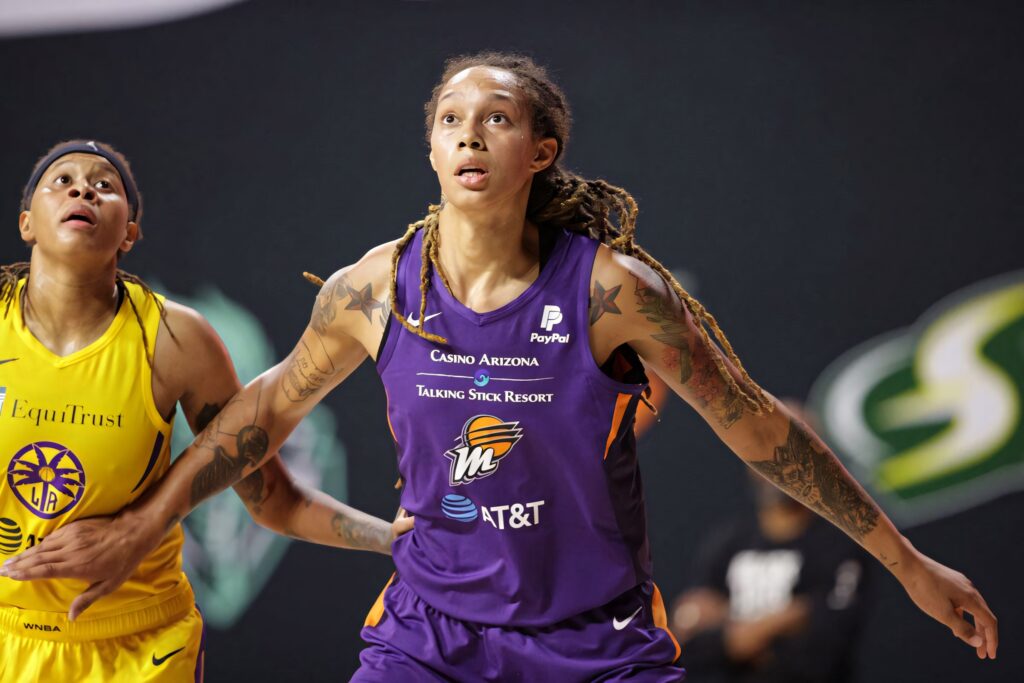 Brittney Griner Phoenix Mercury intense basketball action vivid jersey and detailed tattoos wallpaper
