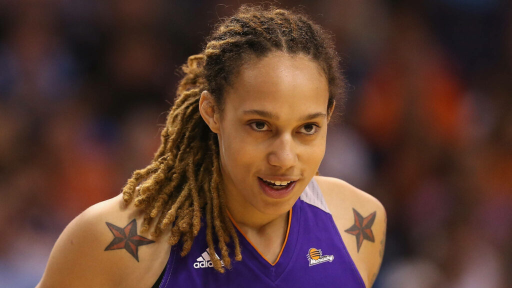 Brittney Griner close-up showing star tattoos on shoulders in realistic WNBA basketball uniform wallpaper