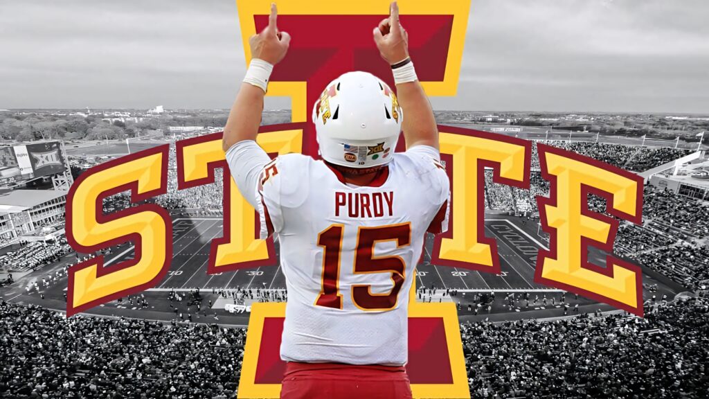 Brock Purdy Iowa State Cyclones quarterback number 15 celebrating on field with team logo backdrop Wallpaper
