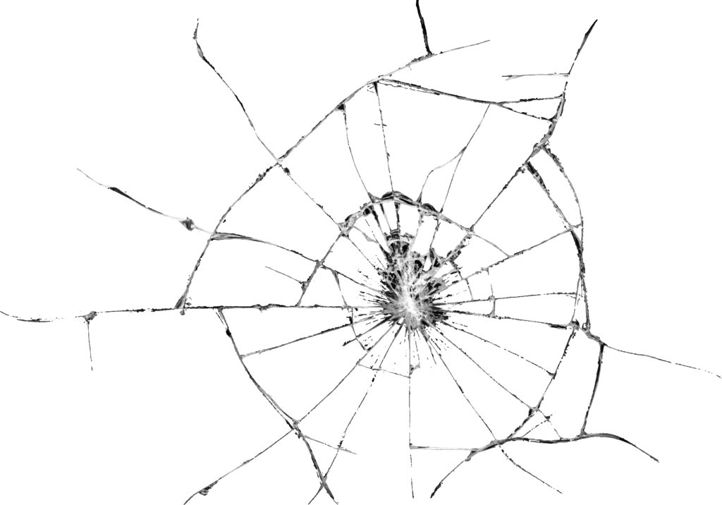Closeup of shattered glass radiating from center with sharp cracks on white background wallpaper